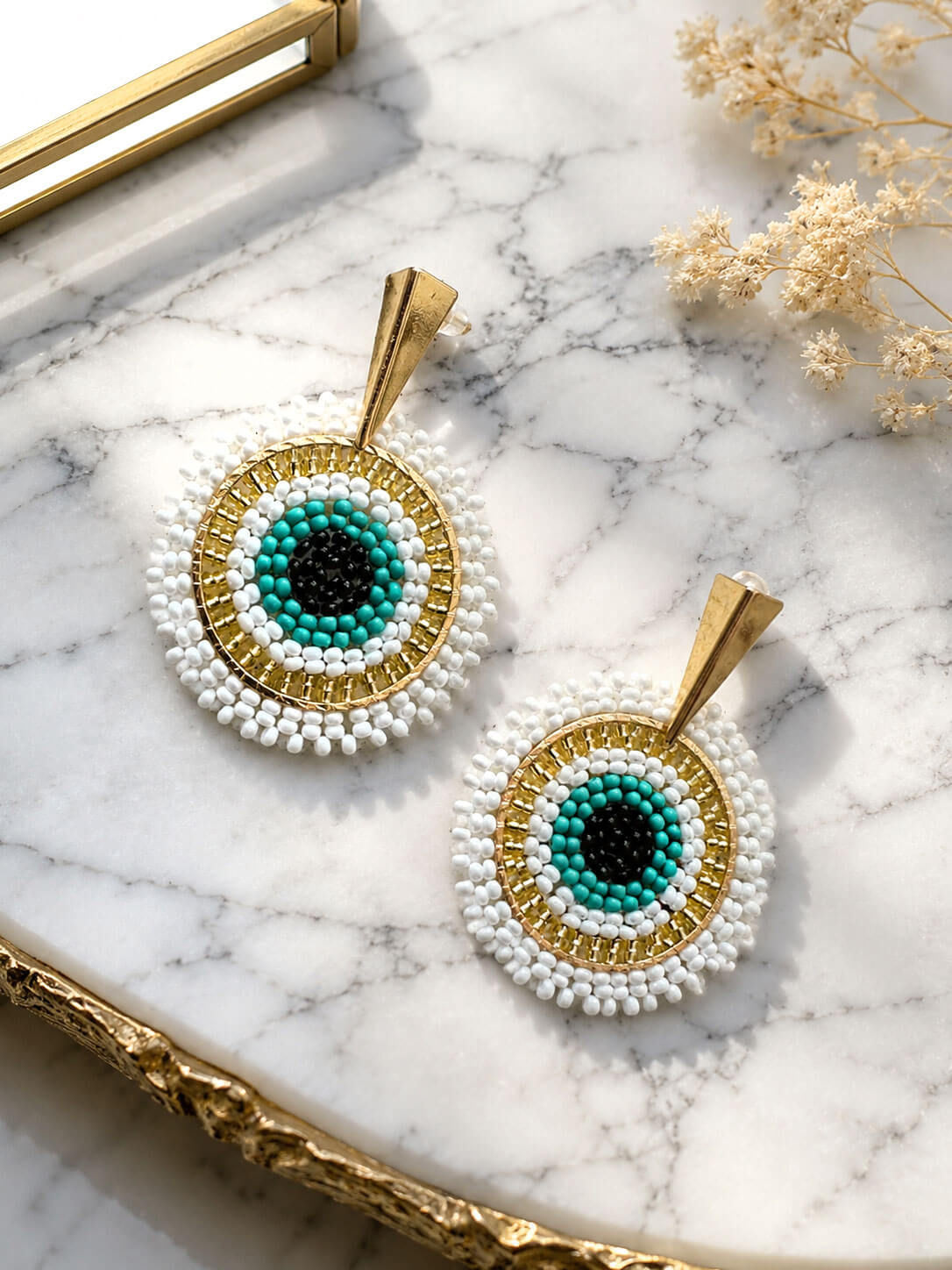 Aretes Ojo Blanco y Azul en Mostacilla