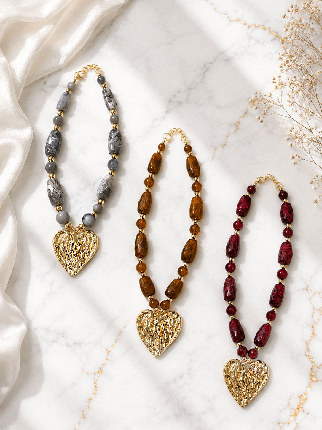 Collar Corazón Dorado con Piedras Marmoladas