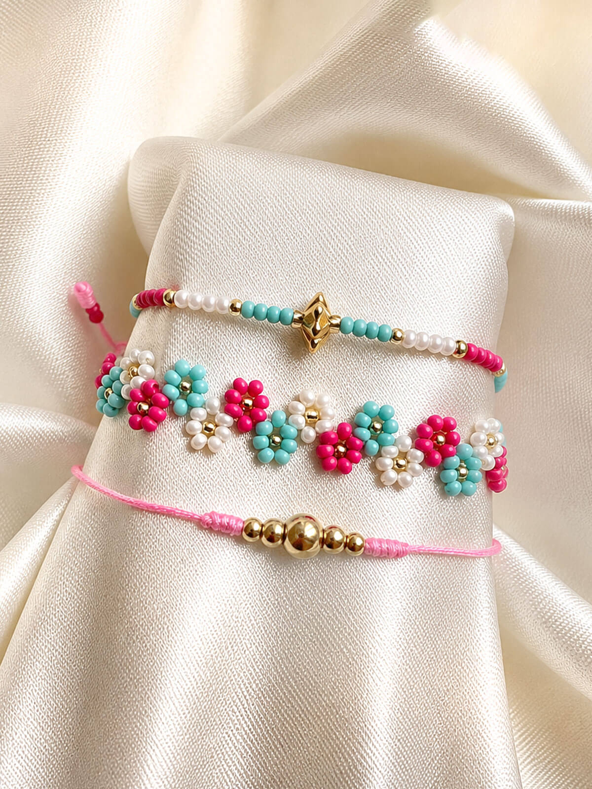 Set de Pulseras Flor Fucsia y Turquesa en Mostacilla