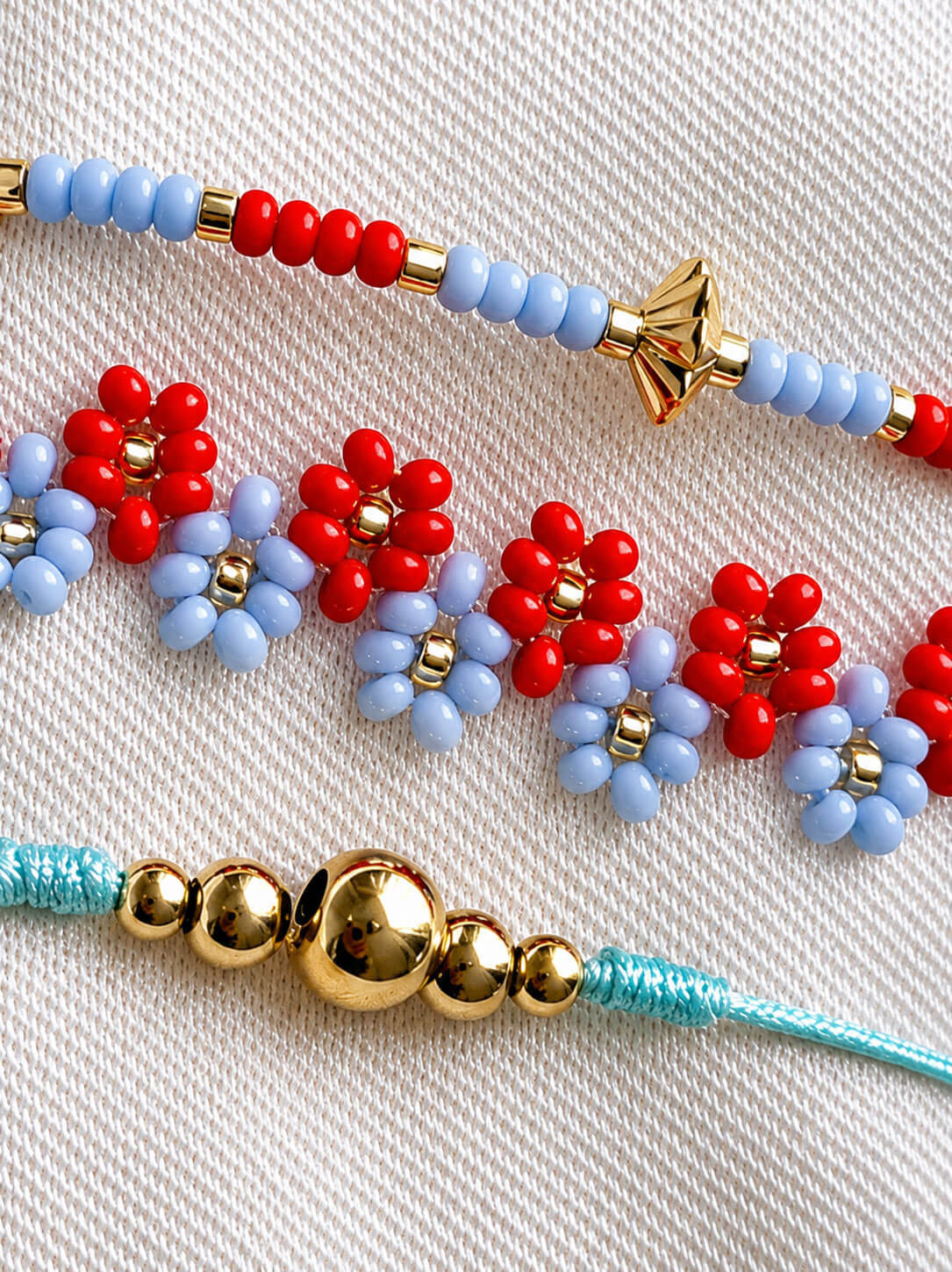 Set de Pulseras Flor Azul Cielo y Rojo en Mostacilla